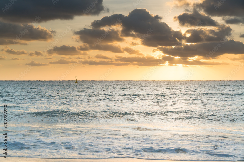 Ocean and sunset sky with clouds Ocean and sunset sky with clouds