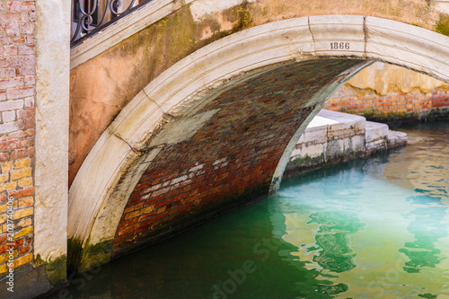 Bridge over a narrow canal in Venice