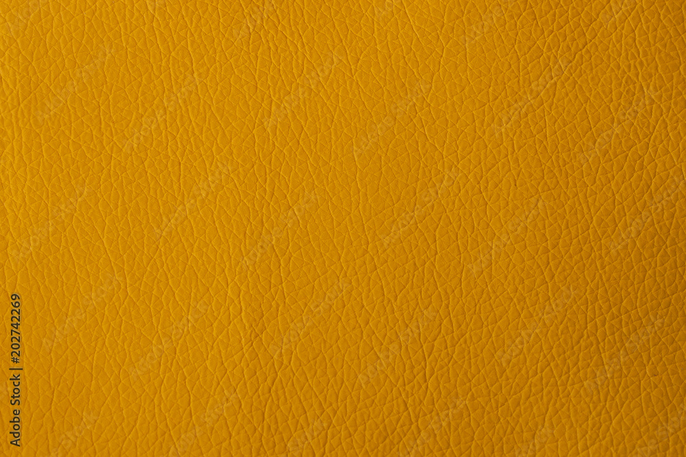 Natural leather yellow. Background and texture. Natural leather yellow. Background and texture.