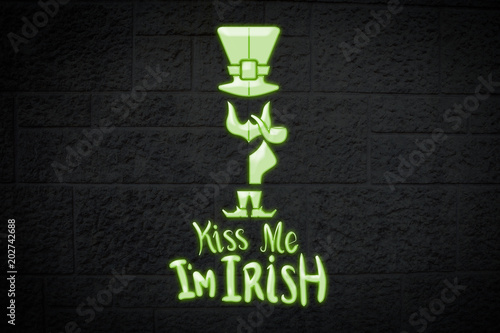 patricks day greeting against black brick wall