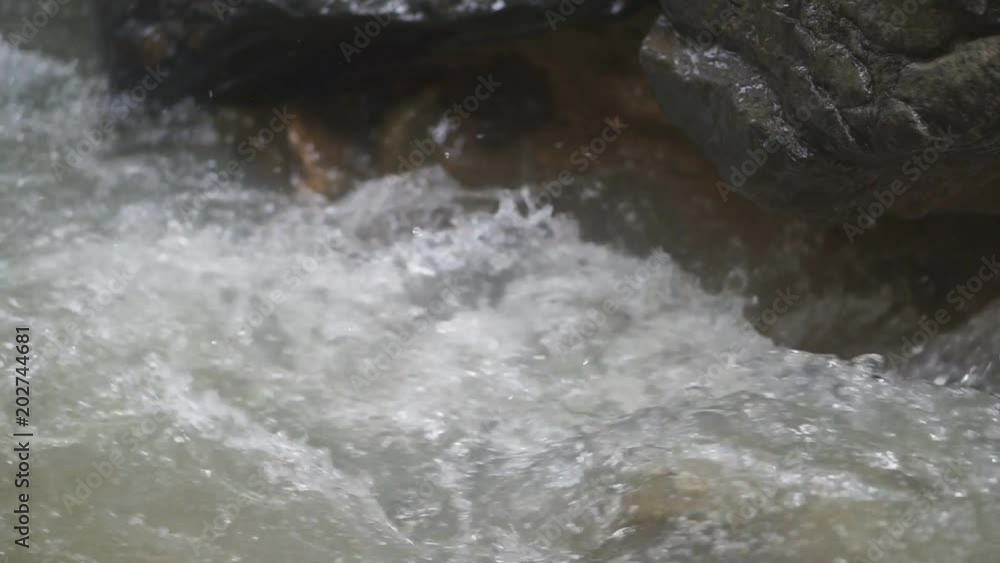 Small waterfall and stream flowing. Small waterfall and stream flowing.