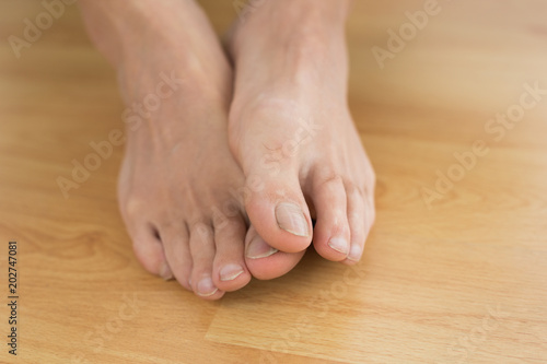 Bare feet on parquet floor