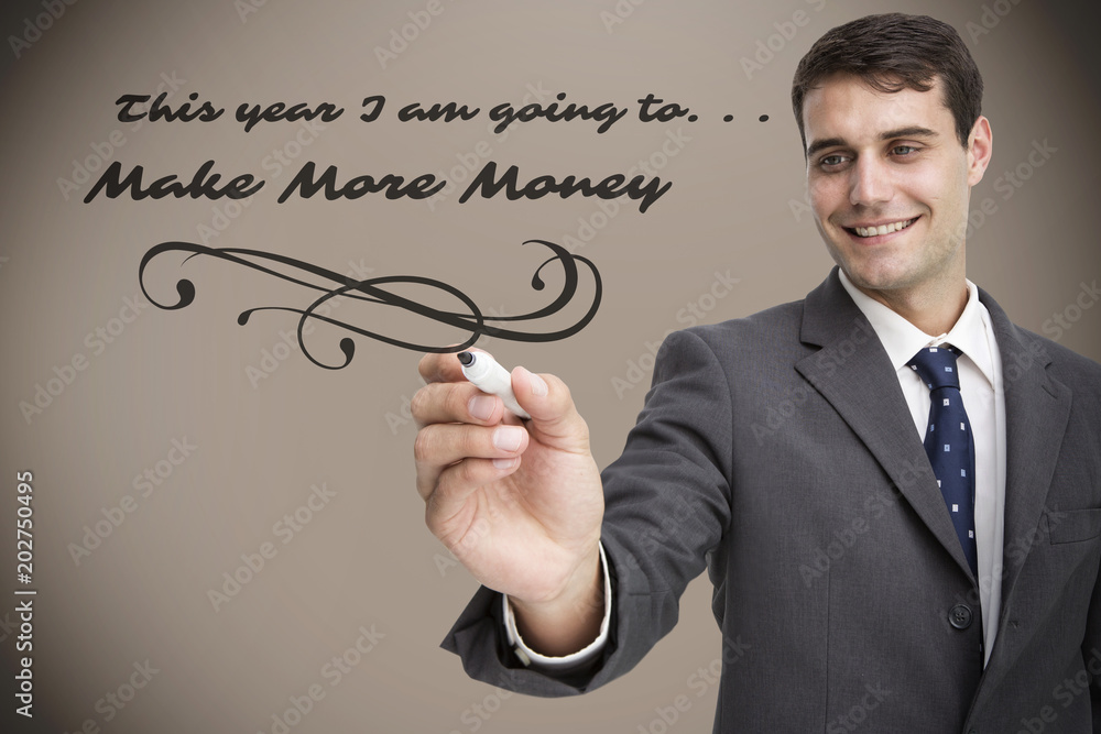 Young businessman writing something against grey background with vignette Young businessman writing something against grey background with vignette