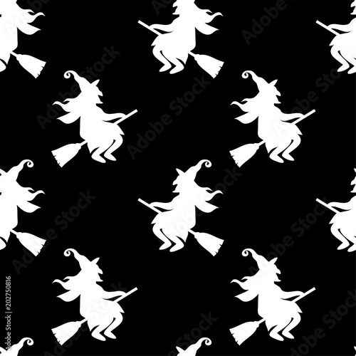 Abstract seamless halloween pattern for girls or boys. Creative vector background with cat, whitch, halloween. Funny pattern for textile and fabric. Fashion halloween style. Colorful bright picture