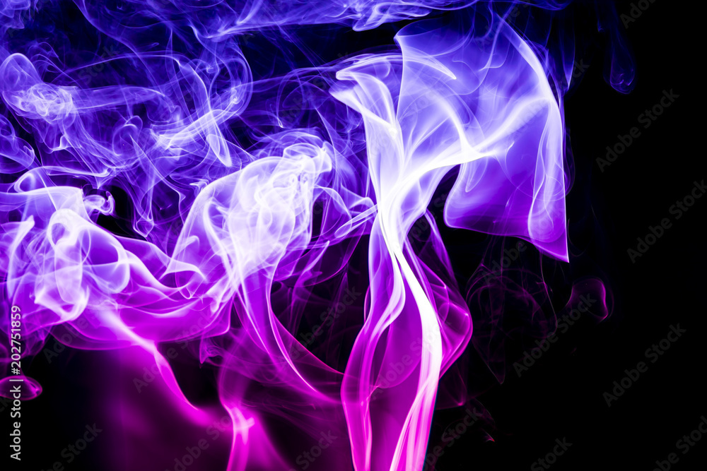 Colored smoke on black background Colored smoke on black background