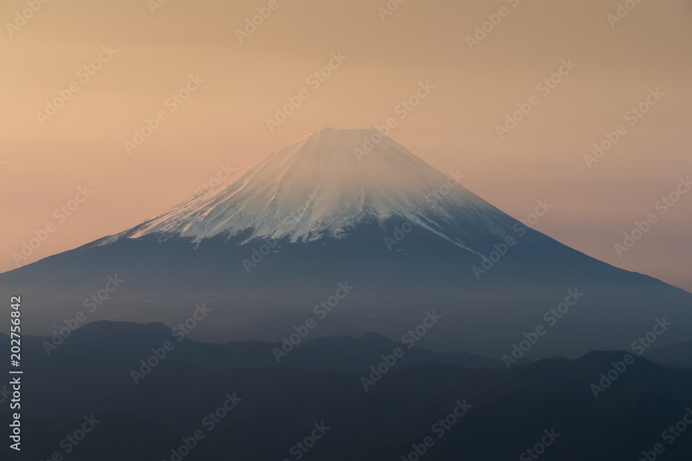Top of Mt. Fuji with sunrise sky in spring season