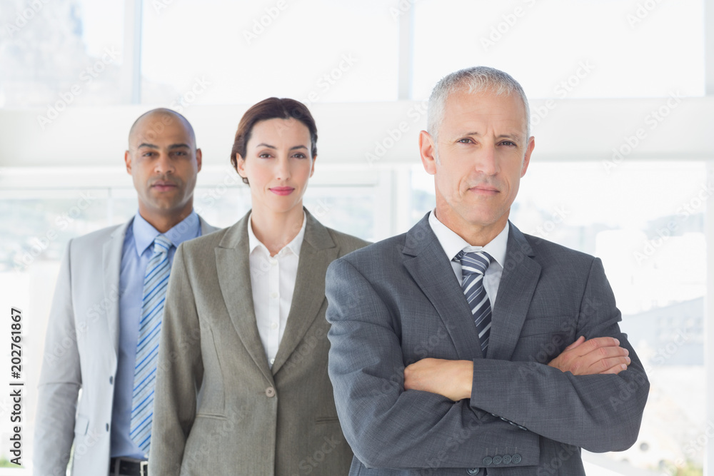 Business colleagues looking at camera Business colleagues looking at camera