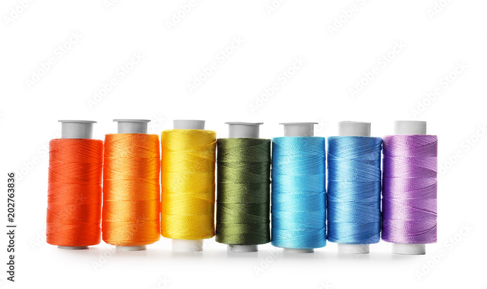 Color sewing threads on white background Color sewing threads on white background