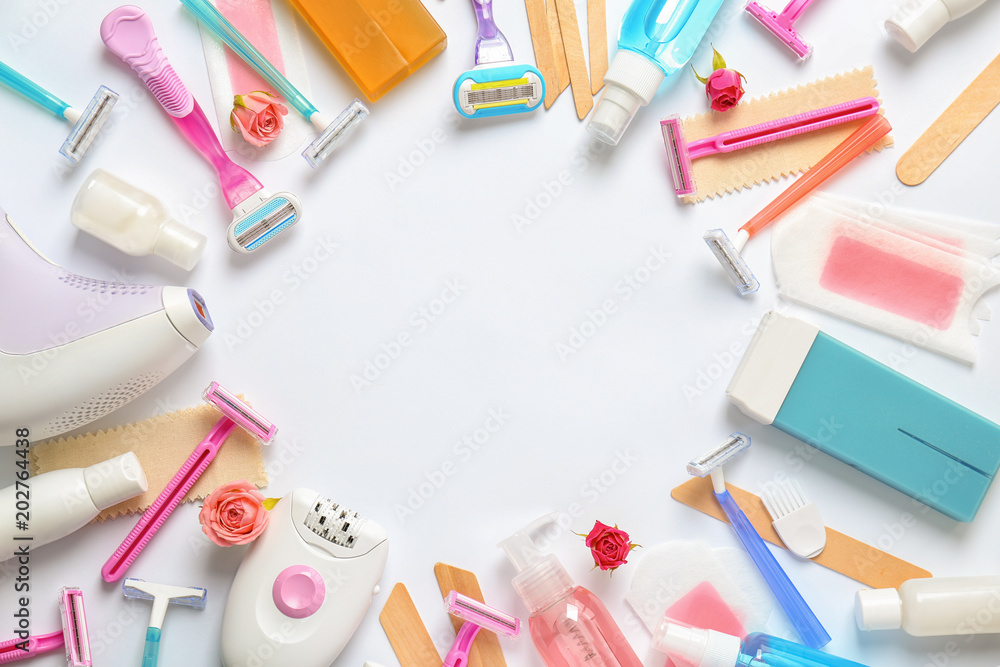 Set for epilation on white background, flat lay Set for epilation on white background, flat lay