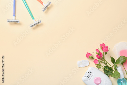 Set for epilation on color background, flat lay