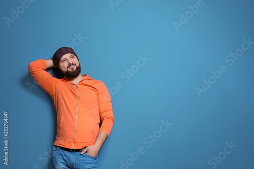 Portrait of young man on color background © New Africa