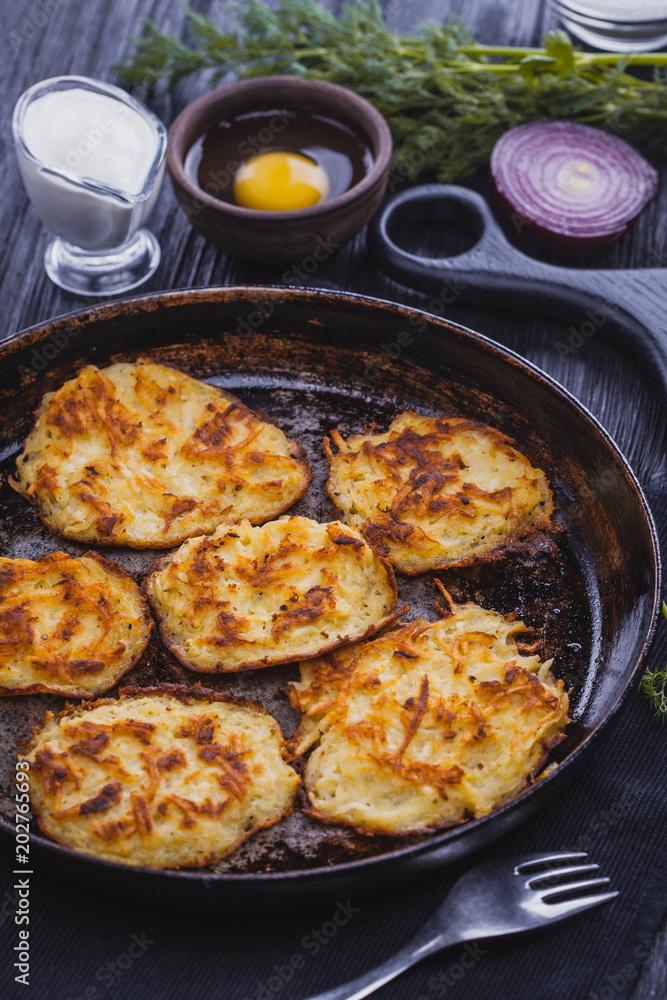 Homemade Traditional potato fritters on a Background Homemade Traditional potato fritters on a Background
