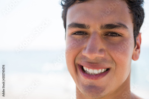 Close up portrait of smiling handsome man