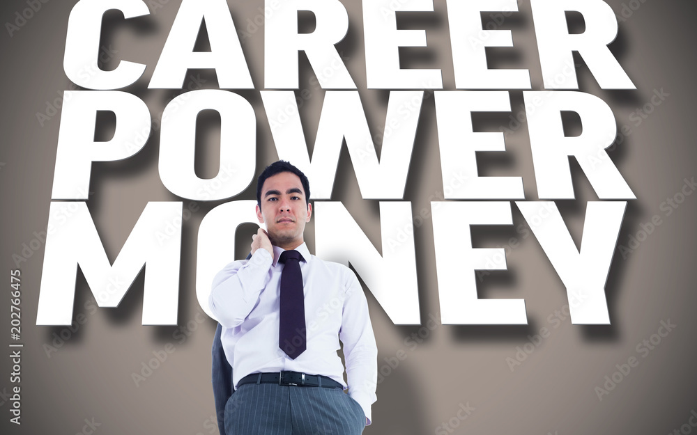 Unsmiling businessman standing against grey background with text Unsmiling businessman standing against grey background with text