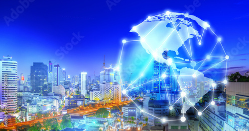 The glow of technology in the world concept  World Map with top view of the city at night