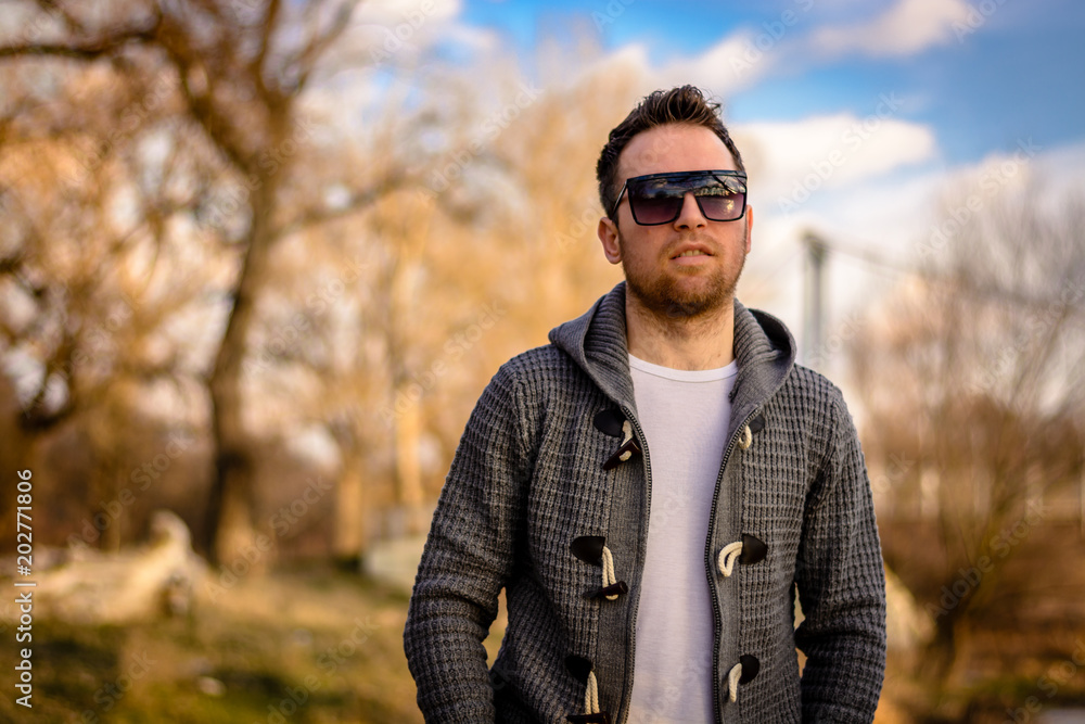 Close-up portrait of man with beard and sunglasses, outdoor Close-up portrait of man with beard and sunglasses, outdoor
