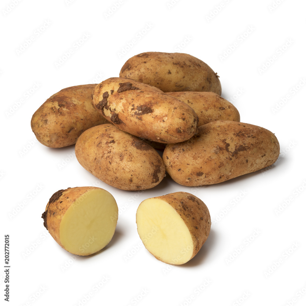 Fresh picked raw whole and sliced Diamant potatoes from Cyprus Fresh picked raw whole and sliced Diamant potatoes from Cyprus