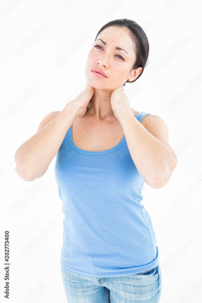Pretty brunette suffering from neck pain Pretty brunette suffering from neck pain