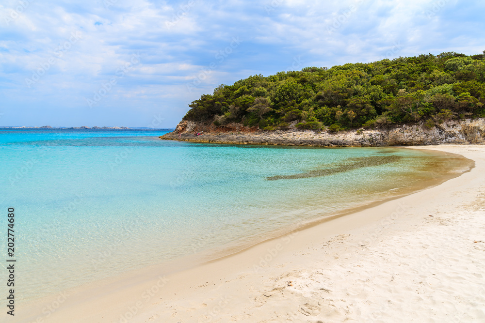 Azure crystal clear water of Petit Sperone beach, Corsica island, France Azure crystal clear water of Petit Sperone beach, Corsica island, France