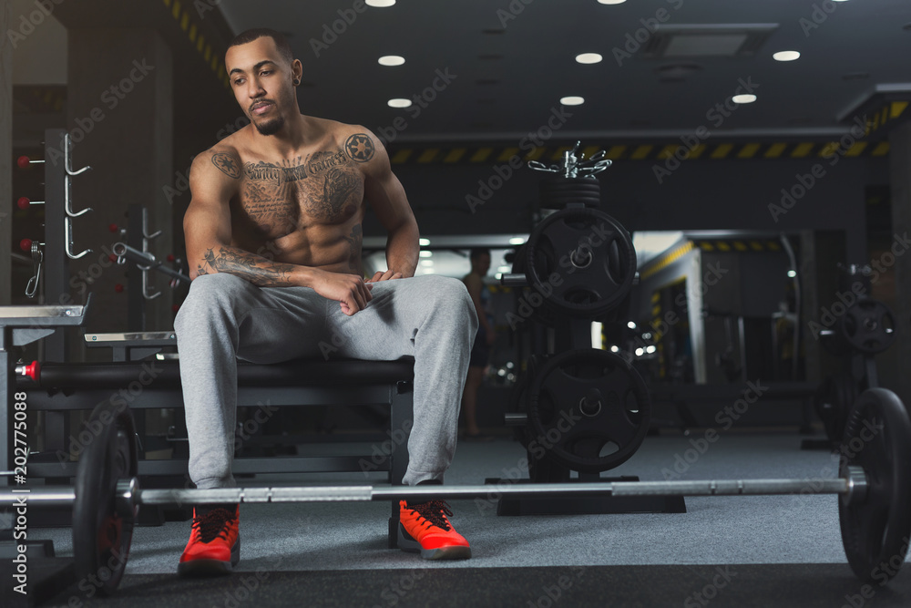 Muscular bodybuilder rest after deadlifts at gym Stock Photo | Adobe Stock