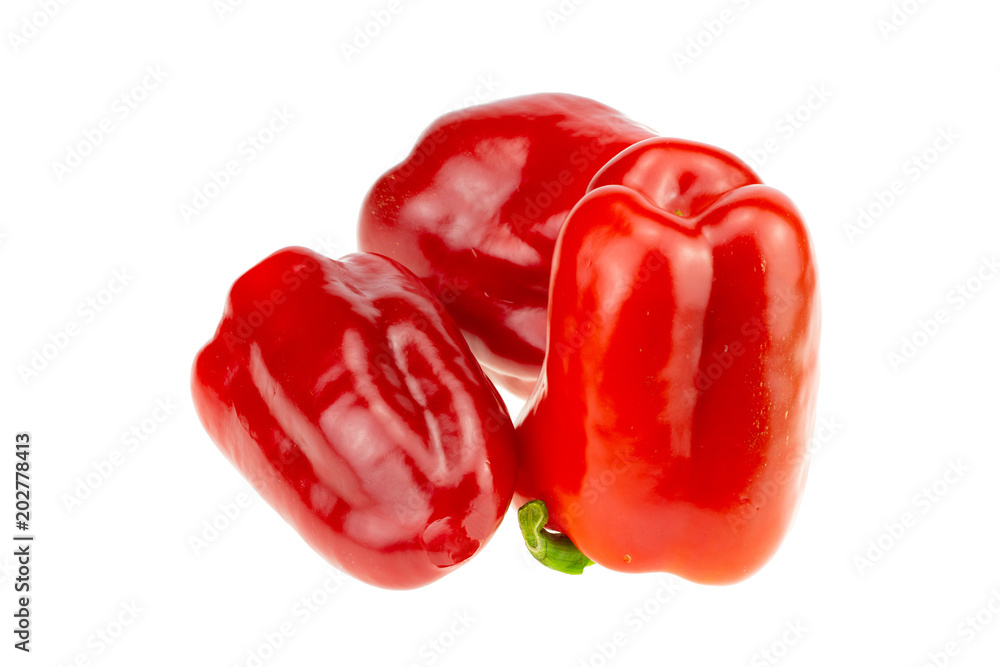 Three Red pepper. Closeup. Isolated on white background.Concept Health. Three Red pepper. Closeup. Isolated on white background.Concept Health.
