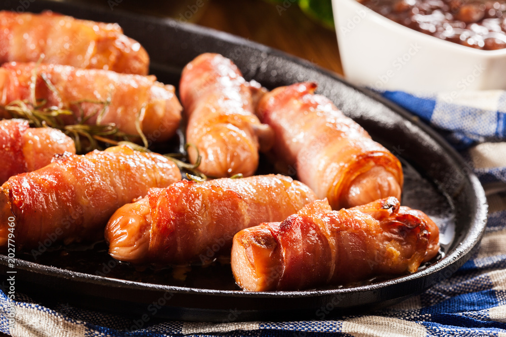 Fotografie Pigs in blankets in baking dish