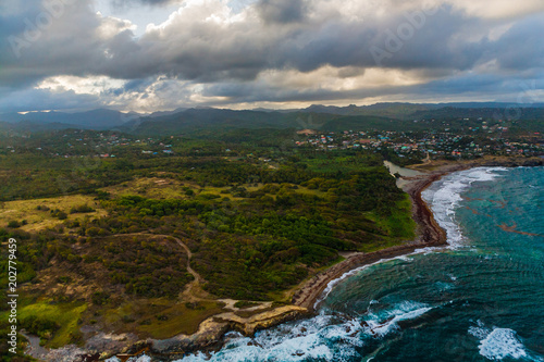Aerial View of Hills, Valleys and a Rustic Caribbean Beach, in St. Lucia