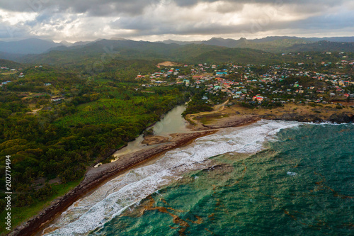 Aerial View of Hills, Valleys and a Rustic Caribbean Beach, in St. Lucia
