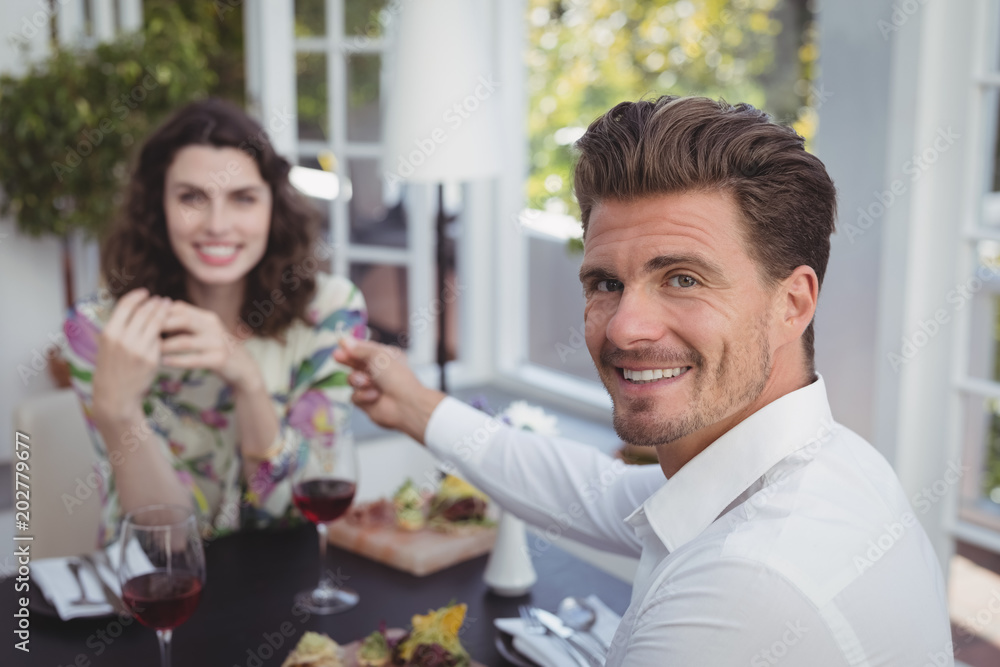 Handsome man offering engagement ring to woman Handsome man offering engagement ring to woman