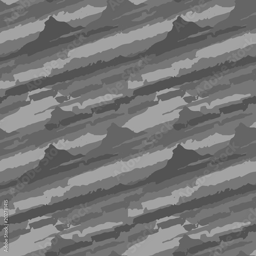 Grey background. Gray grunge pattern in abstract style. Winter camouflage or abstract backdrop.