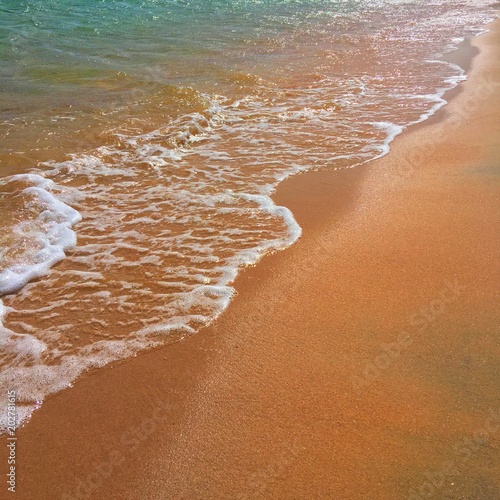 Coast. Waves and sand.