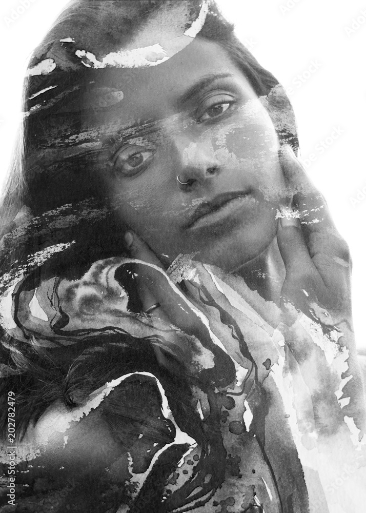 Paintography. Double exposure close up portrait of a young, pretty girl with strong attitude and flawless skin combined with hand drawn watercolor painting gives a unique texture black and white Paintography. Double exposure close up portrait of a young, pretty girl with strong attitude and flawless skin combined with hand drawn watercolor painting gives a unique texture black and white