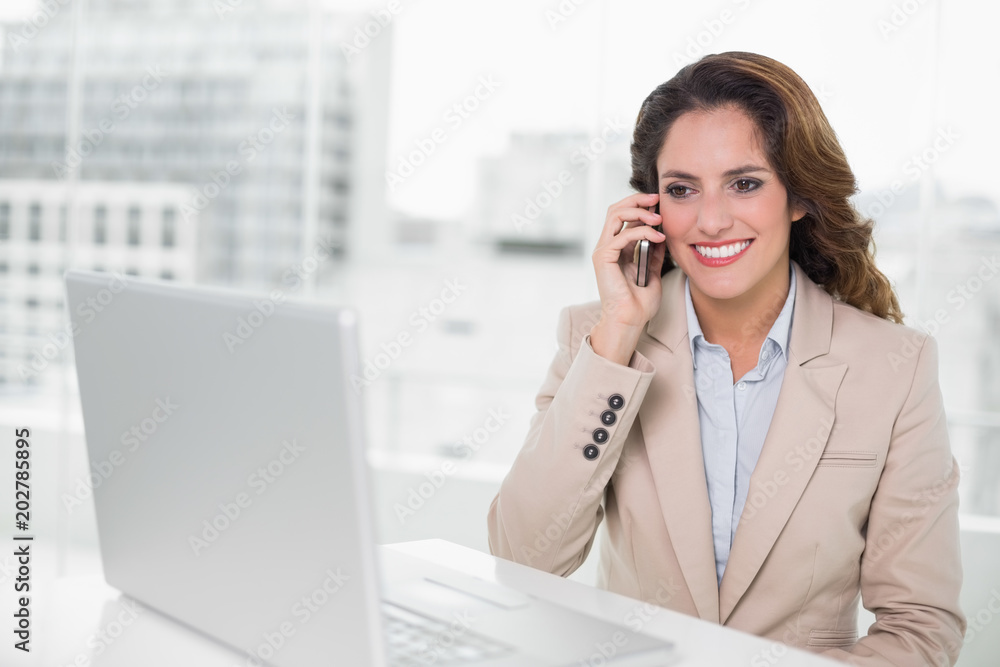 Attractive businesswoman on the phone Attractive businesswoman on the phone