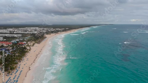 Tropical beach and waves stormy sky