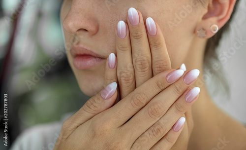 Obraz na płótnie Beautiful woman's nails with beautiful french manicure ombre w salonie