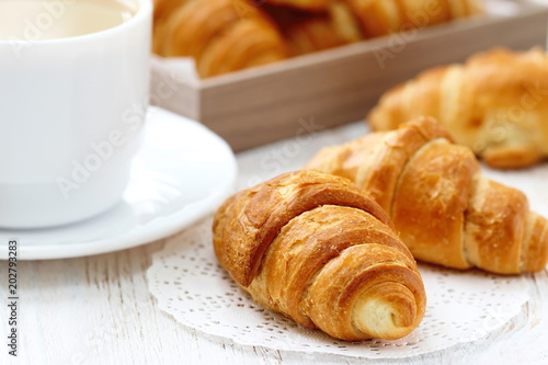 White coffee and croissant for breakfast