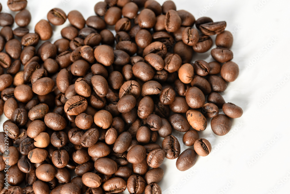 Coffee beans isolated on white background area for copy space Coffee beans isolated on white background area for copy space