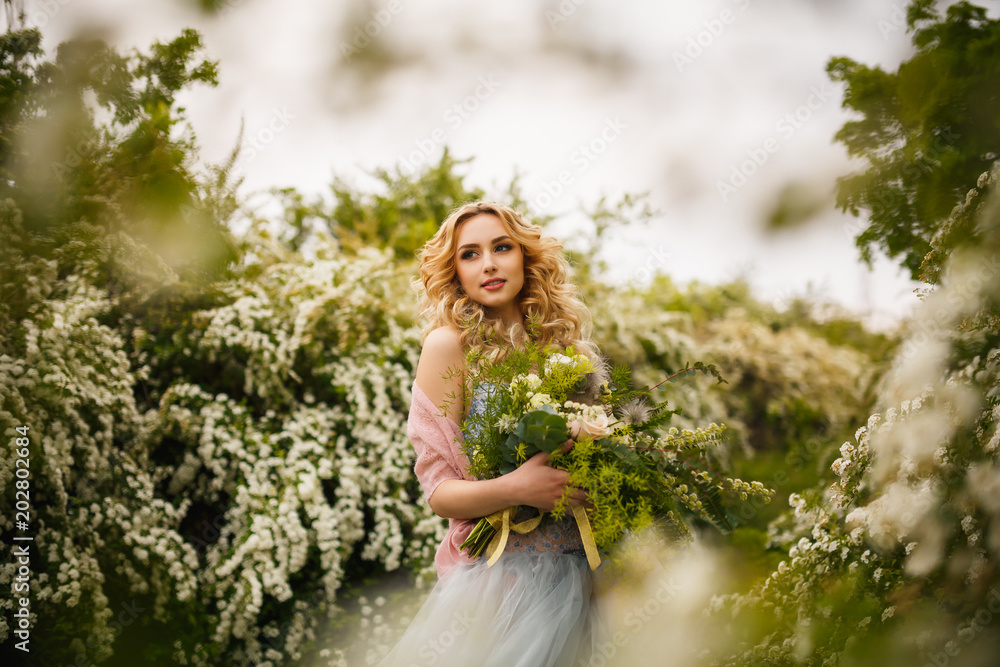 gorgeous bride style enjoying walking in summer or spring forest