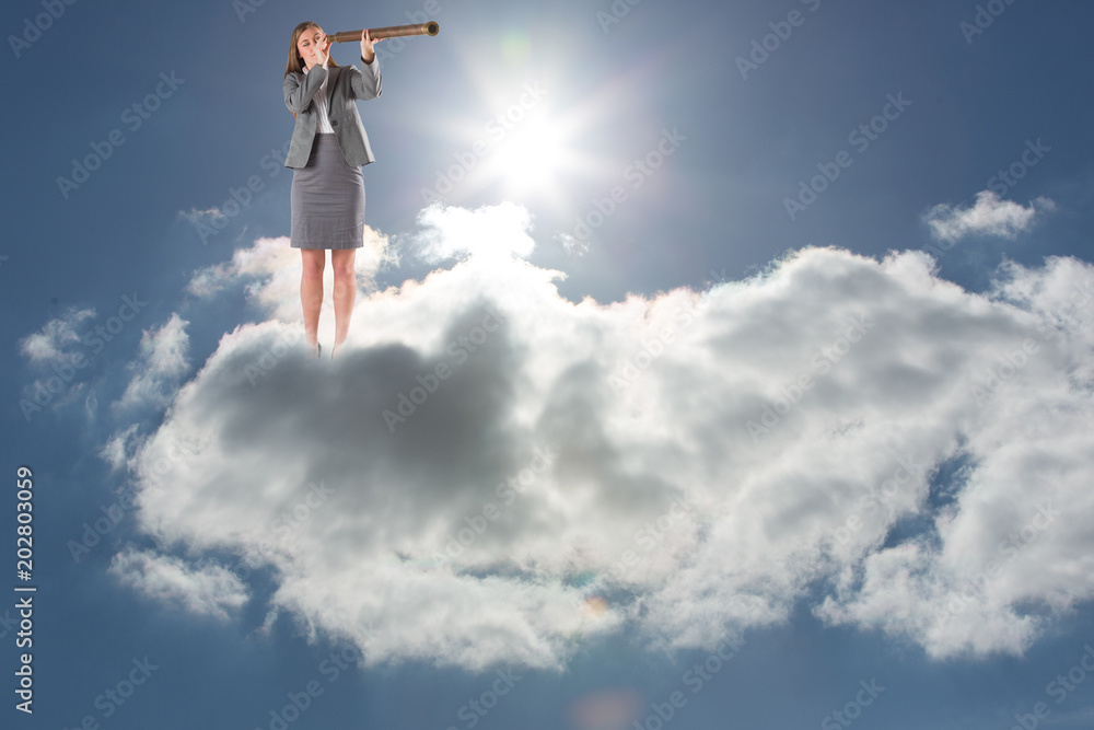 Businesswoman looking through a telescope against blue sky with clouds and sun Businesswoman looking through a telescope against blue sky with clouds and sun