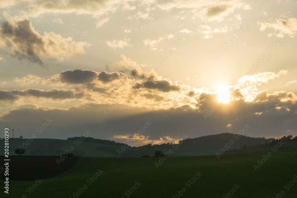 Sunset on meadow with hills and tree. Slovakia Sunset on meadow with hills and tree. Slovakia