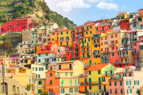 Manarola colorful streets overlooking scenic shoreline photo