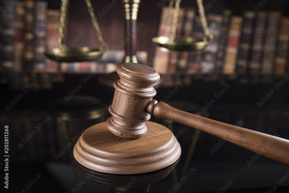 Law and justice concept, wooden gavel, mirror reflection background