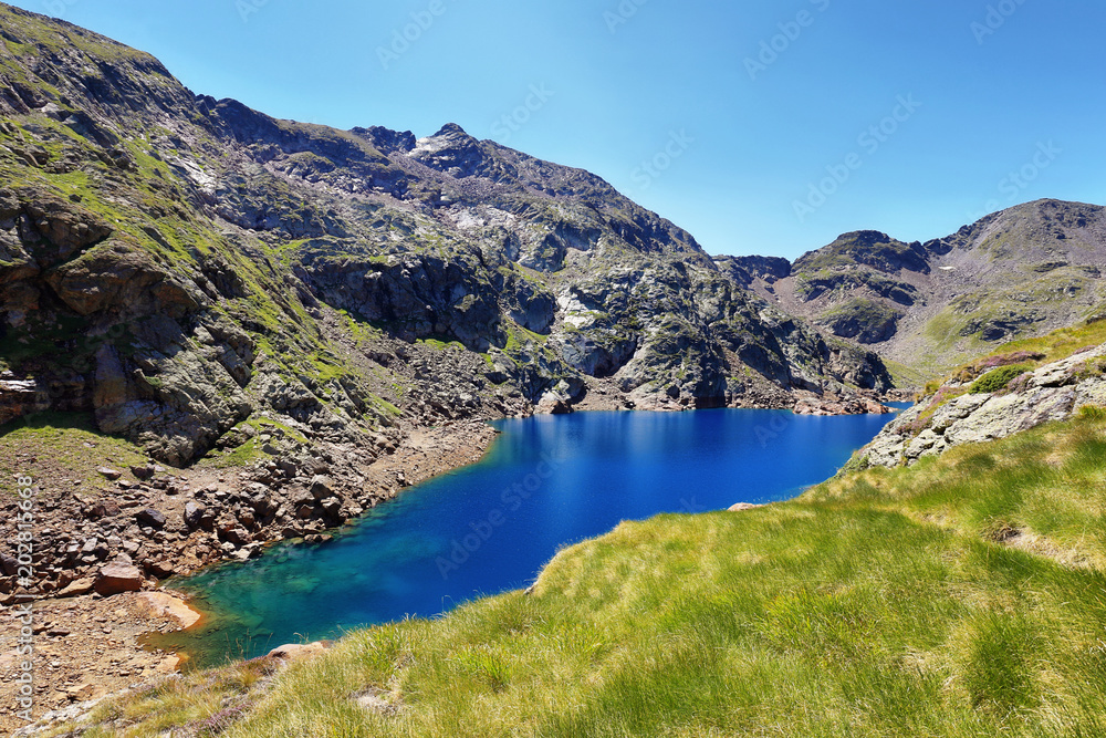Tristaina high mountain lakes in Pyrenees. Andorra.