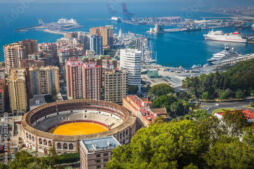View of Malaga with bullring and harbor. Spain