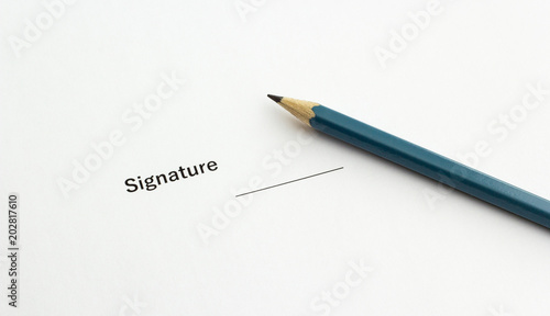 Important document for signing with a pencil, closeup