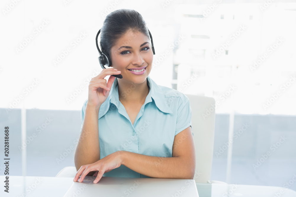 Confident businesswoman wearing headset Confident businesswoman wearing headset