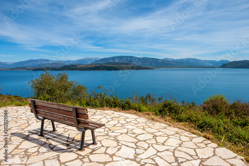 Bench with nice view to the sea - tranquil scene from Corfu, Greece