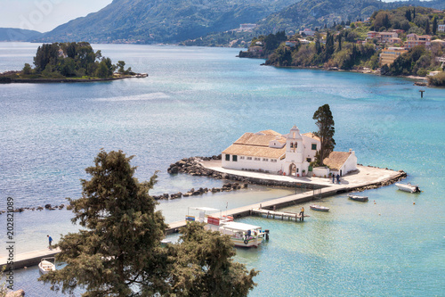 The Panagia Vlacherna Monastery of Panayia with the Mouse Island in Corfu, Greece photo