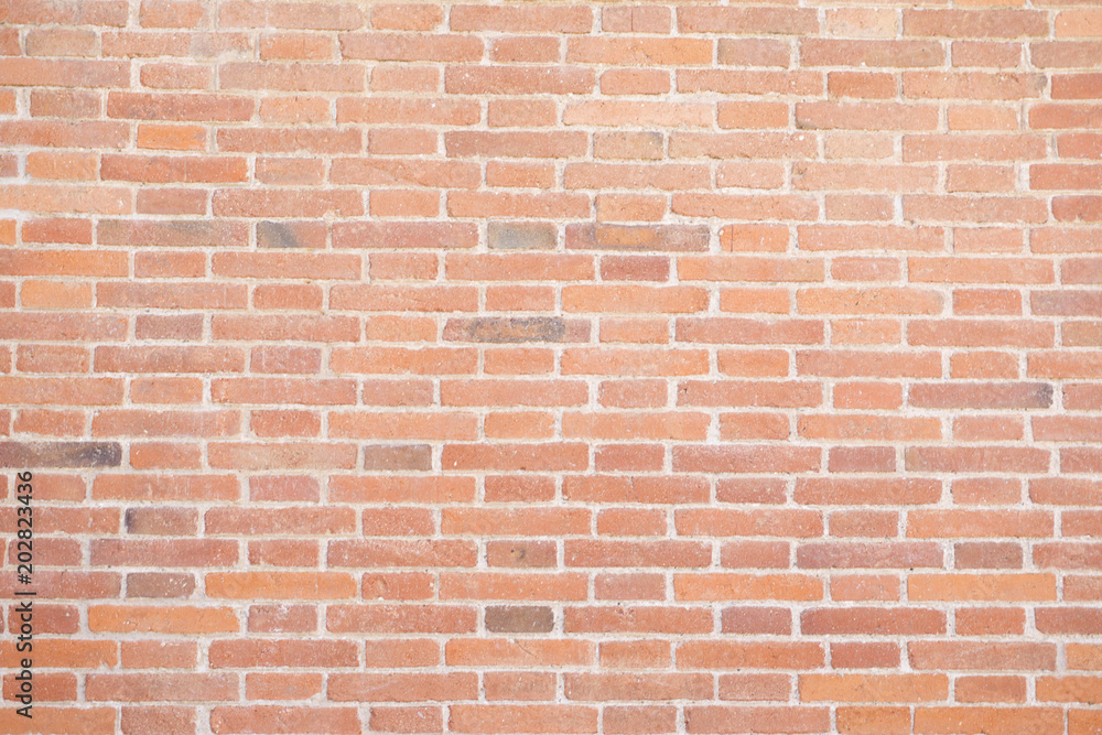Orange grunge brick wall texture Orange grunge brick wall texture