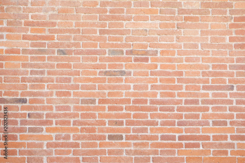 Orange grunge brick wall texture